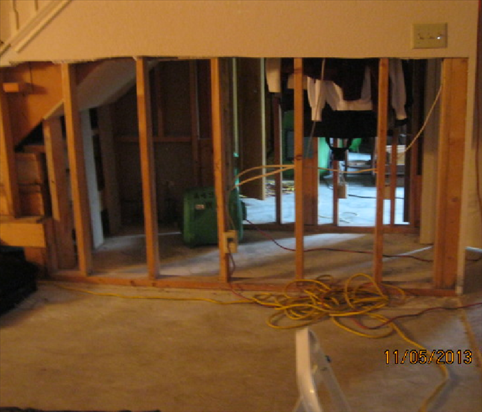 Walls removed 4' up from the floor through two rooms of a home
