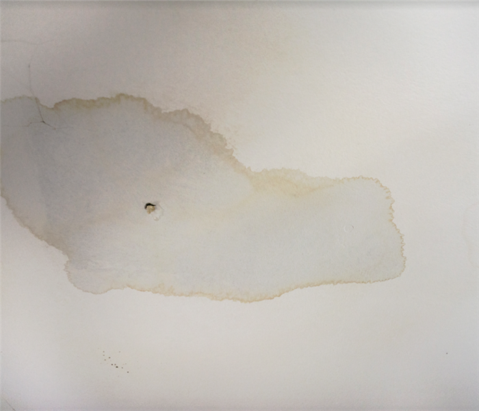 a white water damaged wall