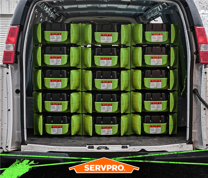 servpro van stacked with drying equipment